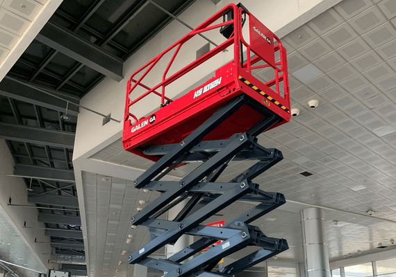Indoor electric scissor lift for shopping mall maintenance